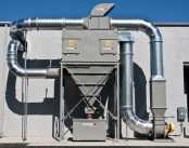 Cartridge dust collector removes wood dust.