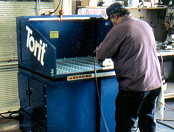 Downdraft table removes steel dust.